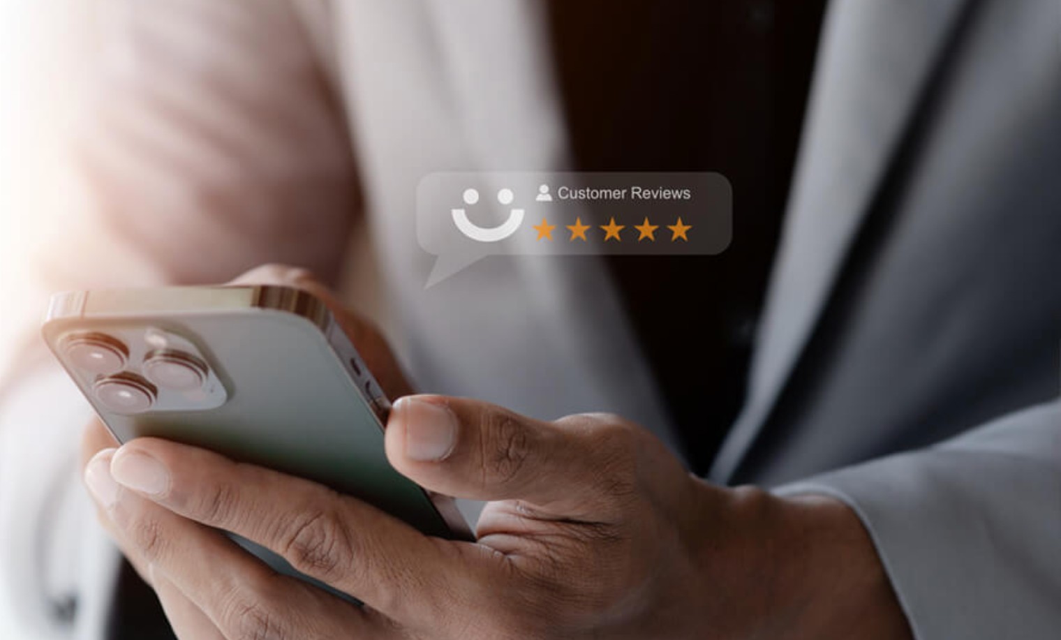 Person holding a smartphone with a five-star customer reviews rating overlay